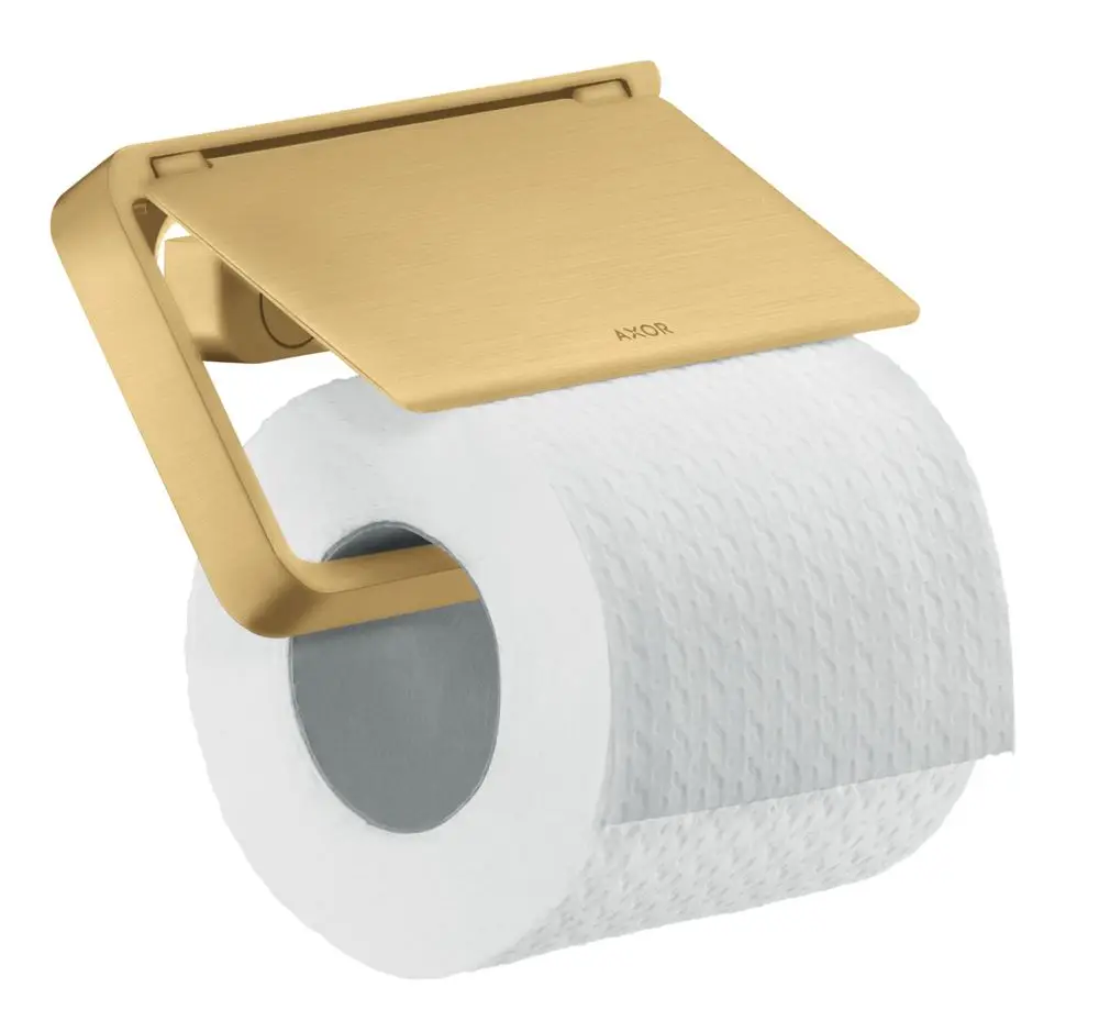 Toilettenpapierhalter in gebürsteter Goldoptik von AXOR, mit klappbarem Deckel und einer Rolle weißen Toilettenpapiers.